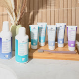 Close-up of DR. Wild Emoform Pure & Fresh Toothpaste being applied to toothbrush – gum care and fresh breath