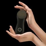 Woman using nebulyft N1 RF device on her neck and jawline at home