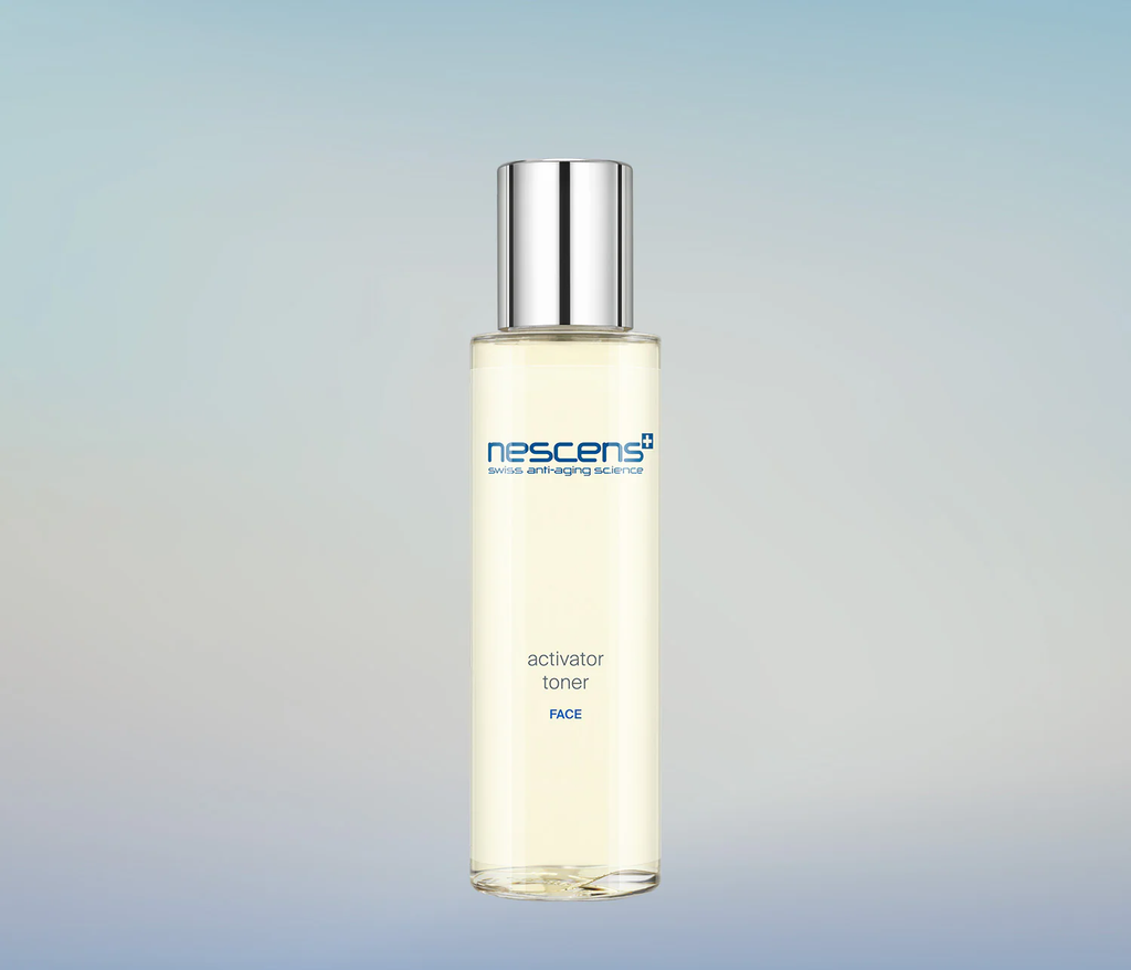 Nescens Activator Toner spray bottle with mist in motion