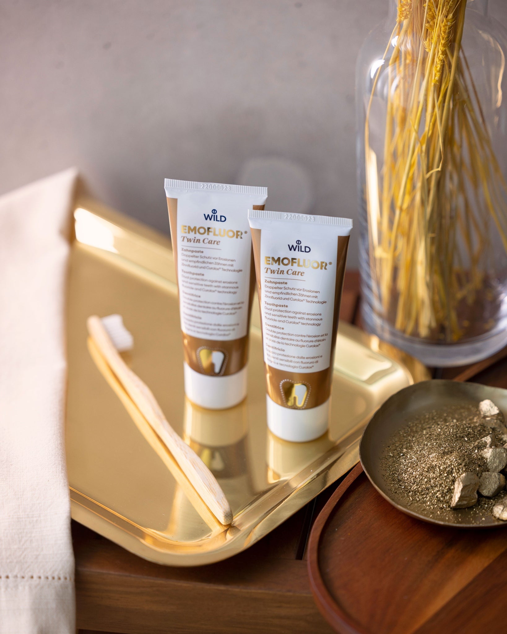 Tube of Dr. Wild EMOFLUOR Twin Care with sodium + stannous fluoride and peptide technology